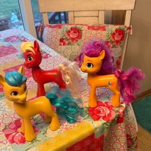 Three My Little Pony figurines